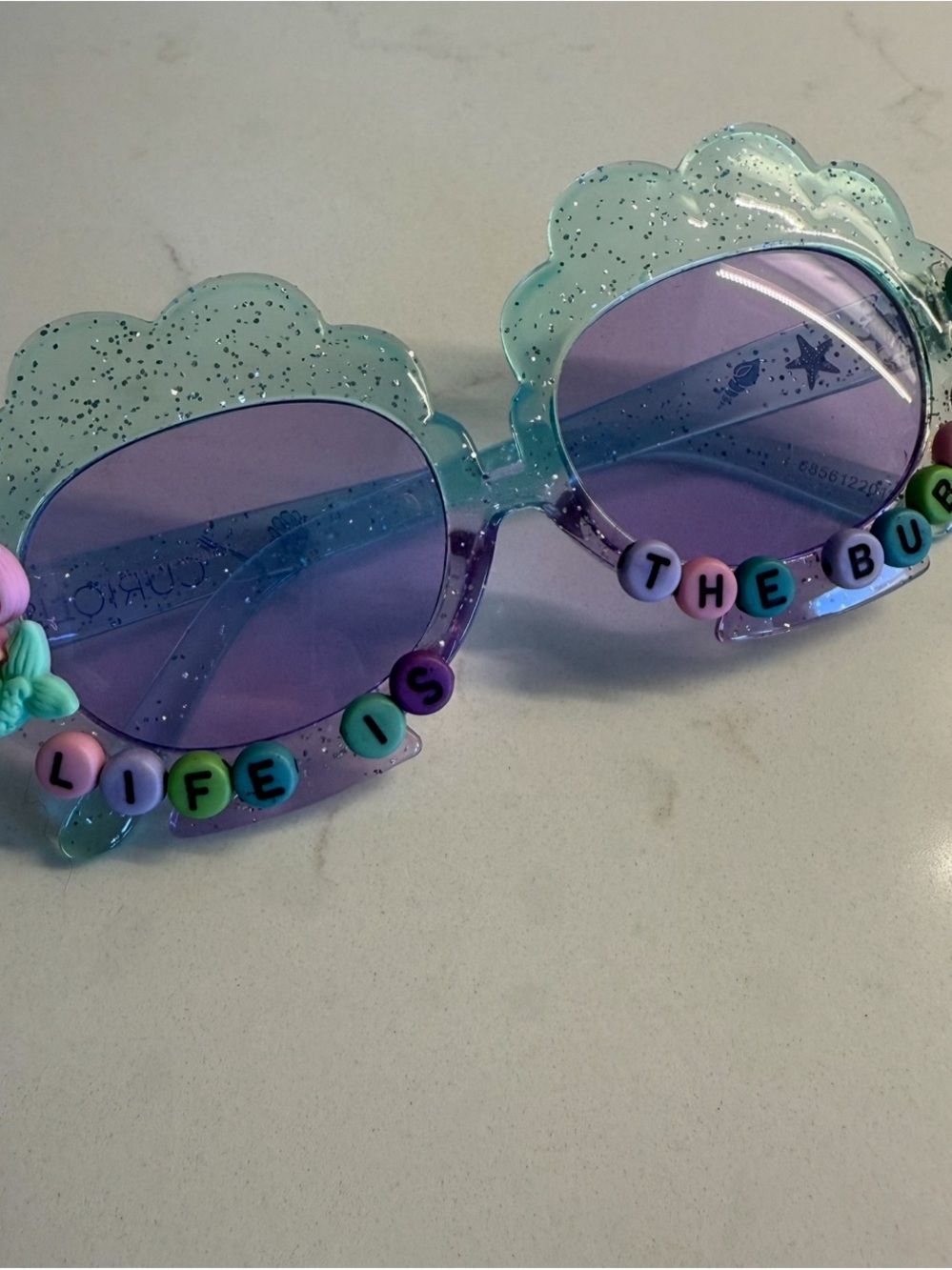 Playful Mint Glitter Cloud Sunglasses with Purple Lenses